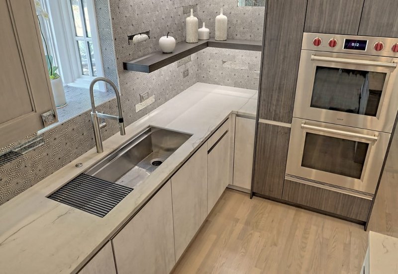 Modern kitchen with stainless steel sink and Leicht custom cabinets in Atlanta, GA